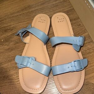 New without tags- target brand sandals. Very cute light blue, soft soles